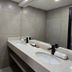 Village Iguassu Hotel bathroom vanity with double sinks and large mirror in Foz do Iguaçu
