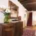 Art Palace - Residenza Giardini Venice hallway with staircase, wooden beams, dresser and floral decor