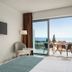The Freij Resort by Marissol, Ayia Napa guest room with sea-view balcony and seating area
