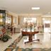 Hotel San Pedro del Fuerte in Medellín lobby with chandelier, glass table, and seating area