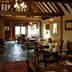 Chequers Inn by Greene King Inns in Uckfield dining room with exposed beams and wooden tables