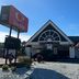 Econo Lodge Ormond Beach North - Daytona exterior with gabled entrance, sign, and parking lot in Ormond Beach
