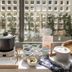 Motel Shanghai Liuzhou Road Guangda Convention And Exhibition Centre buffet setup with bowls and a steaming pot in Shanghai