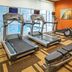Courtyard by Marriott Aberdeen at Ripken Stadium gym with treadmills, exercise bikes and weight bench