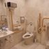 Accessible bathroom at Toyoko Inn Yokohama Stadium Mae No 1 in Yokohama with toilet, urinal and grab bars