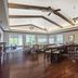 Homewood Suites by Hilton Louisville-East breakfast room with tables, chairs, and ceiling fans in Louisville