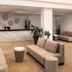 The Freij Resort by Marissol lobby in Ayia Napa with marble front desk and beige seating