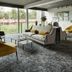 Go Hotel Østerport lounge in Copenhagen with sofa, chairs, glass tables and large windows