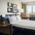 Residence Inn by Marriott Las Vegas Stadium Area guest room with bed, desk and city view
