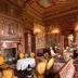 B&B Chateau de Villersexel in Villersexel, ornate historic lounge with carved woodwork and fireplace
