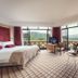 Soho Hotel & Casino at Sun City Resort room with balcony, mountain and lake views