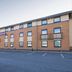 Purple Roomz Preston South (Cuerden Way) exterior in Preston with brick facade and parking area