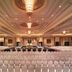 Makati Shangri-La, Manila ballroom with rows of chairs and chandeliers in Makati