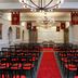 Eglinton Arms Hotel, BW Premier Collection in Glasgow meeting room with rows of black chairs and red carpet