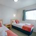 Bella Vista Motel Blenheim room with two single beds and window light in Blenheim