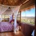 Villa Bella Bed & Breakfast Inn in La Cruz de Huanacaxtle bedroom with canopy bed and valley view