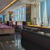 Xinji Garden Hotel in Nanchang dining room with buffet tables and floor-to-ceiling windows