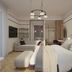 Hotel Taormina in Bardolino guest room with bed, sofa, TV, balcony doors and lake view