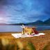 Gateway Chikmagalur picnic setup by the lake with mountain views in Chikamagalur