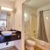 Motel 6-Vallejo, CA - Six Flags West bathroom with sink vanity, toilet, and shower-tub combo