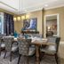 Club Wyndham Nashville dining room with table, chandelier, balcony, and city views