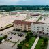Unaway Hotel Occhiobello A-13 in Rovigo, exterior view with parking lot and surrounding greenery