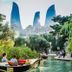 Sultan Inn Boutique Hotel Baku with garden canal and view of Baku Flame Towers