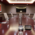 Desert Diamond Casino Tucson boardroom with long conference table and leather chairs