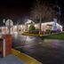 Scottish Inns Harrisburg-Hershey South in New Cumberland, exterior at night with lit parking lot and sign