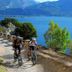 Concept Village Piccola Gardiola, San Felice del Benaco: cyclists on a lakeside path with mountain and water views