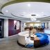 Holiday Inn Express & Suites Lakeland South lobby with curved seating and modern reception area in Lakeland