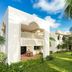 Diamonds Malindi in Malindi: white resort buildings with arched balconies and lush tropical gardens
