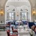The Phoenicia Malta in Valletta, elegant restaurant dining room with chandeliers and tall arched windows