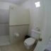 Mar de Cortez in Cabo San Lucas bathroom with toilet, sink and walk-in shower
