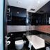 Montcalm Brewery Townhouse in London bathroom with freestanding tub, rain shower and vessel sink