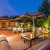 Best Western Plus Kurhotel an der Obermaintherme terrace with dining tables, umbrellas and lush greenery in Bad Staffelstein