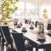 Gartenstadt Hotel in Ludwigshafen am Rhein dining room with set tables and large windows