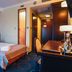 Hotel Admiral in Gdansk guest room with twin bed, desk and hallway view