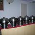 Hotel Buddha International in Bodh Gaya buffet counter with stainless steel serving dishes on a cabinet