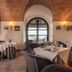 Sunstar Hotel Piemont in Asti dining room with arched brick ceiling and garden views
