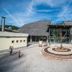 Eco Terme Snovik in Laze v Tuhinju with a circular courtyard and modern glass entrance
