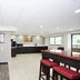 Red Roof PLUS+ Nashville South - Fairgrounds lobby with seating area and breakfast counter