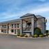 Super 8 by Wyndham Bulls Gap Greeneville Area exterior with two-story motel building and parking lot