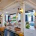 Sari Pacifica Resort & Spa, Redang Island open-air resort lobby with seating and tropical plants
