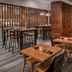 Cleveland Marriott East restaurant dining area in Warrensville Heights with wooden tables and chairs