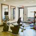 Hampton Inn & Suites by Hilton Cathedral City Palm Springs fitness room with exercise bike, bench and dumbbells