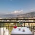 Hotel Cristina in Sorrento balcony with table setting and panoramic sea and mountain views