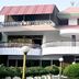Hotel Buddha International in Bodh Gaya with curved balconies and red-roofed exterior