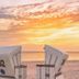 Seehotel Grossherzog von Mecklenburg in Ostseebad Boltenhagen: beach chairs on the beach at sunset