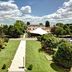 Unaway Hotel Occhiobello A-13 in Rovigo, exterior view of landscaped grounds and parking area